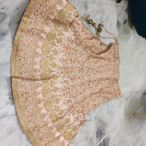 peach colour heavy bridal lehenga