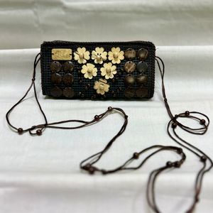 Brown Hand Clutch With Wooden Beads