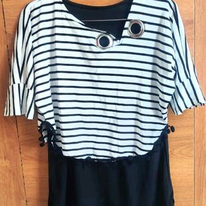 Trendy Striped Top With Grommet Detail.