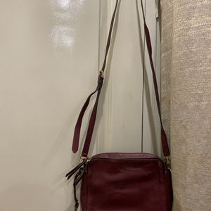 Fossil burgundy sling bag