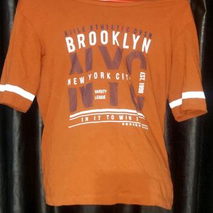 This A  Orange Colour Tshirt With Size S .