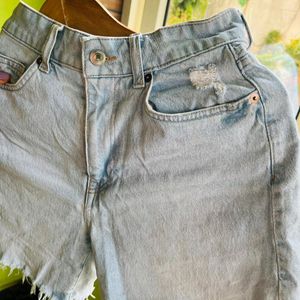 H&M light blue washed ripped shorts