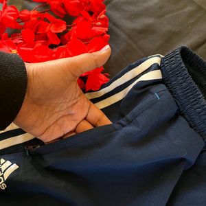 Adidas blue trackpants