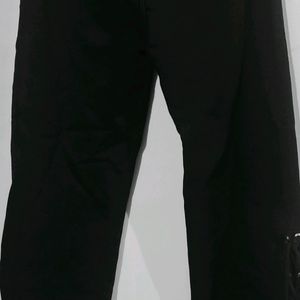 Flared Black Jeans With Cut Design