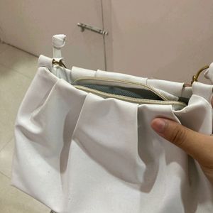 White pearl handbag