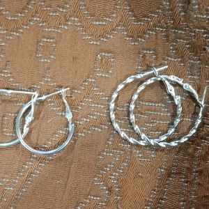 2 pairs of silver hoops