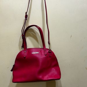 CAPRESE Red Sling Bag With Detachable Strap