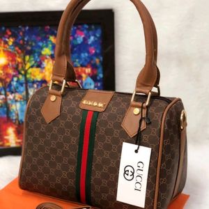 GUCCI DUFFLE HANDY+SLING@390 RS