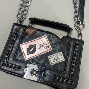 Punched Black Sling Bag.