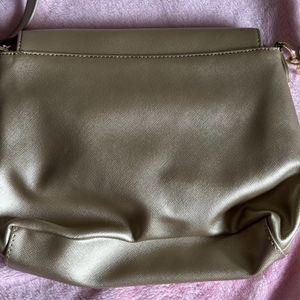 Chic And Spacious Gold Sling Bag