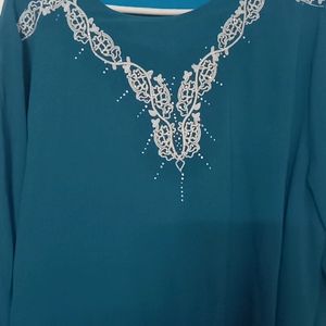 New Teal Tunic, pattern sleeves white embroidery