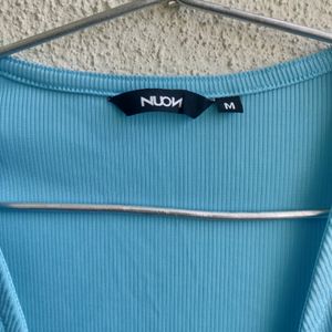 blue wrap cropped top by nuon