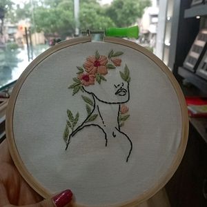 Handmade Embroidery Of Women And Flowers