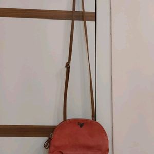 Baggit Leather sling Bag Coral Color With 2 Compar