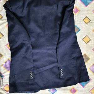 A navy blue Coat