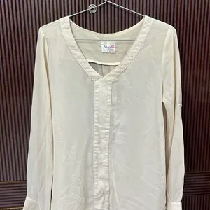 A Nude Color Tunic Top For Office Wear