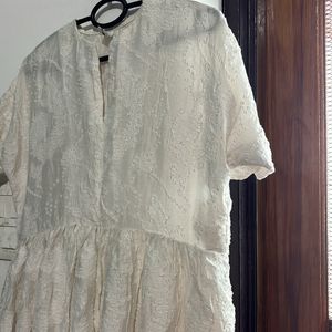 Vintage White Dress with Textured Fabric.