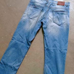 Man Branded Blue Jeans