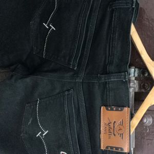 A Black Coloured Solid Casual Jeans