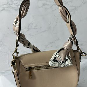 ALDO Ribbon Sling Bag