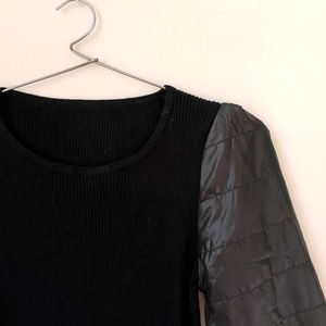 Black Ribbed Top With Puffer Sleeves.