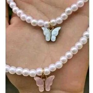 Set Of Pearl Butterfly Necklace