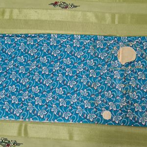 Turquoise blue printed cotton fabric