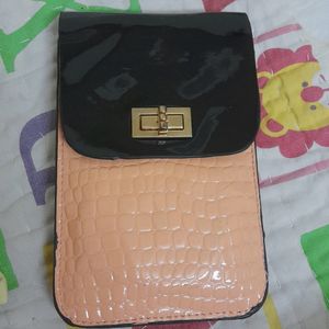 leather mobile pocket with sling, it's has 2 colours, not use even once