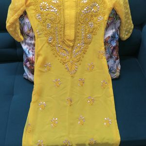 Yellow Chikankari Kurta And White Flared Palazzo