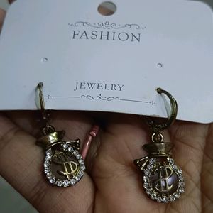 A Dollar Sign Earrings Pair , Very Stylish