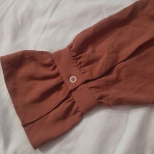 A Maroon Shirt For Women.