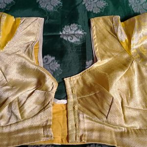 A Bottle Green Colour Saree With Yellow Border