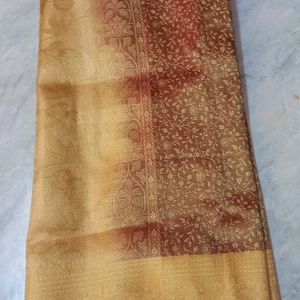 Golden Zari Knitting Work On Brown Base saree