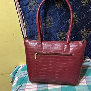 Caprese Maroon Handbag