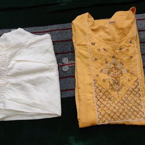 Beautiful Yellow Hand Work Kurta Set.