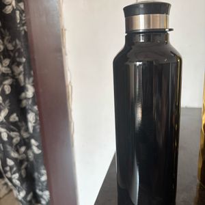 2 Water Bottle, One Coffee Mug And Black White Top