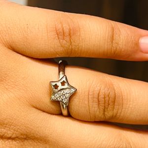 Star shaped silver Stoned ring