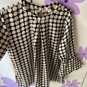 designer polka dot top