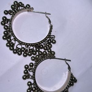 silver round oxidised earings