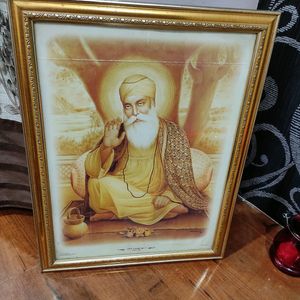 Gurunanak Photo And Laxmi Ganesh Idol