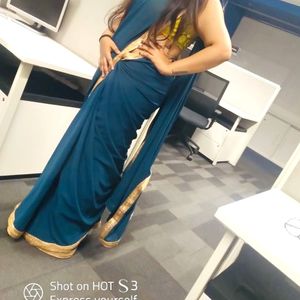 Teal Saree With Unstitched Blouse