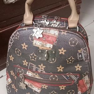 LV Brown Leather Small Backpack cum hand bag...