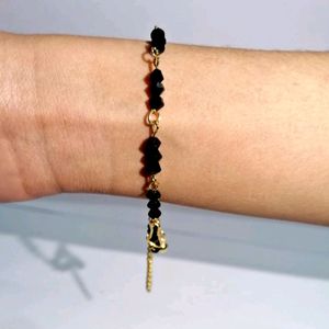 Beautiful golden and Black crystal Bracelet Or ank