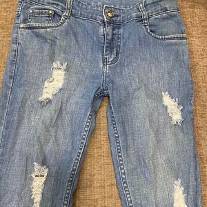 Ripped Blue Jeans