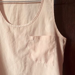 A Peach Colour Top.  Size:M.