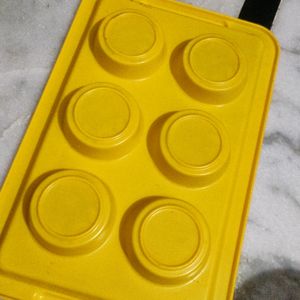 Yellow plastic tray