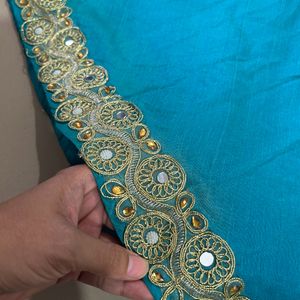 Teal Colour Plain Ghagra With Golden Border