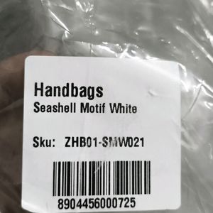 Zouk Seashell Motif White Handbag