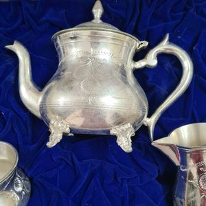 Antique Tea Set with silver polish