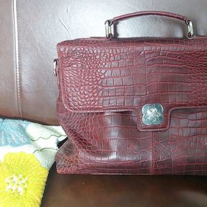 Hi-design embossed leather handbag